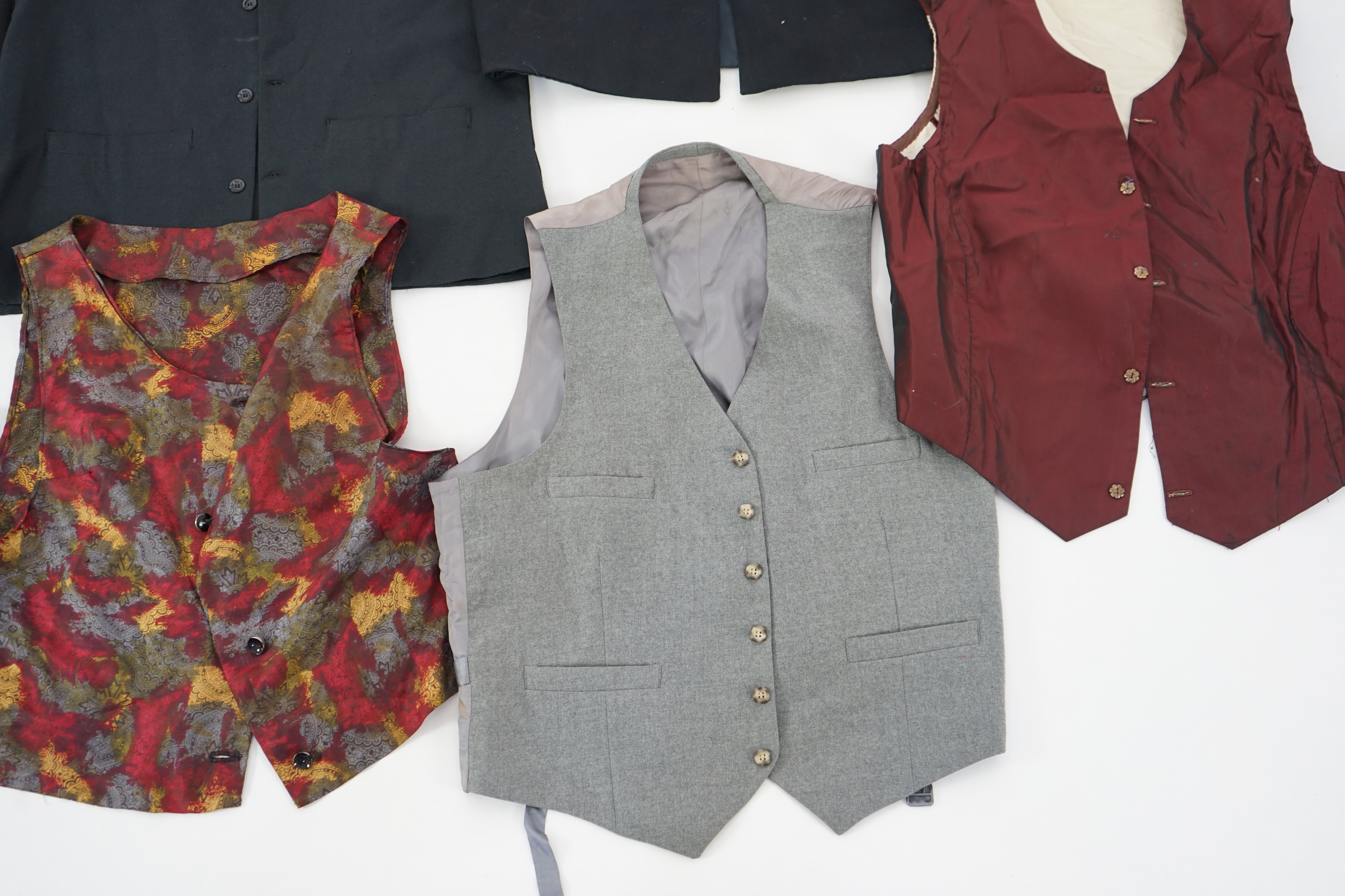 Five assorted men's period waistcoats (darker colours). Ex Pavilion Opera.